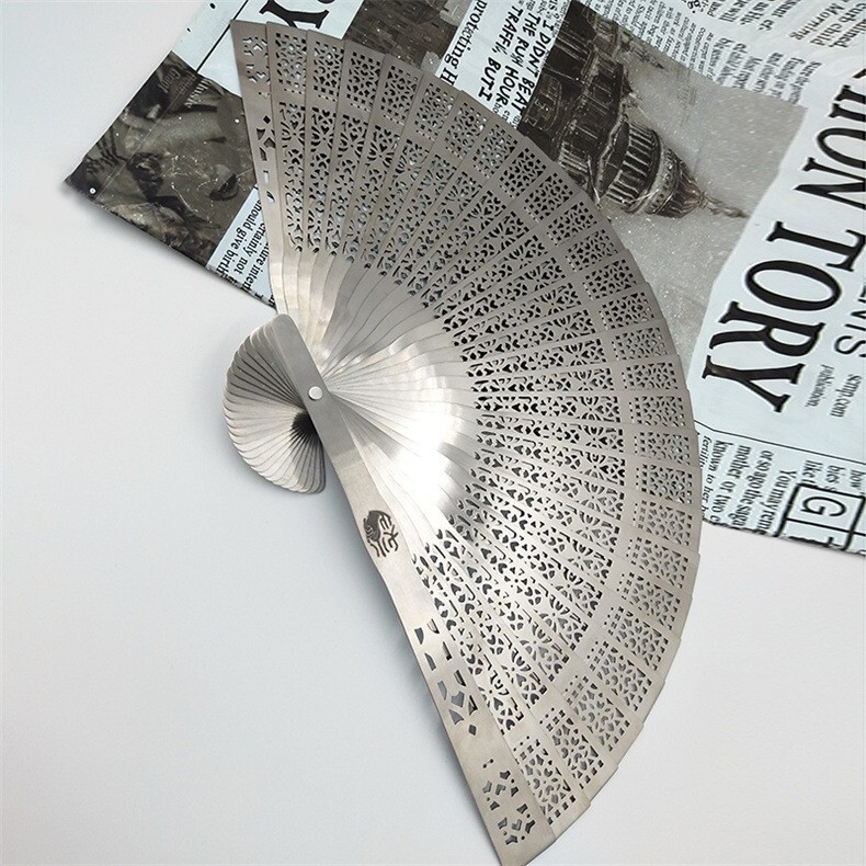 Titanium alloy folding fan with Chinese style hollow metal kung fu fan