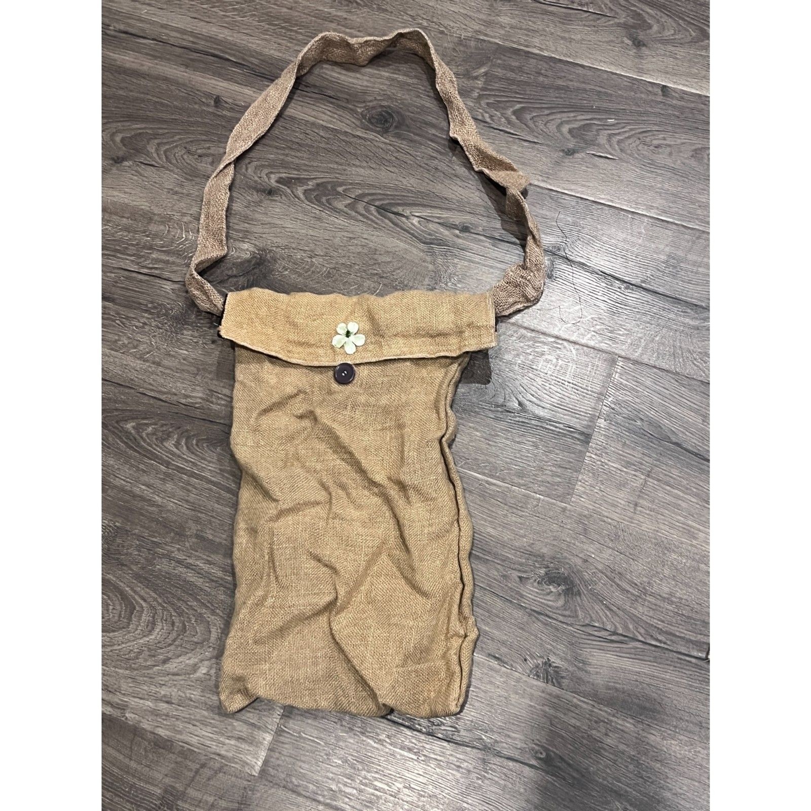 Handmade rustic burlap tote bag with laurel button accent and floral lining