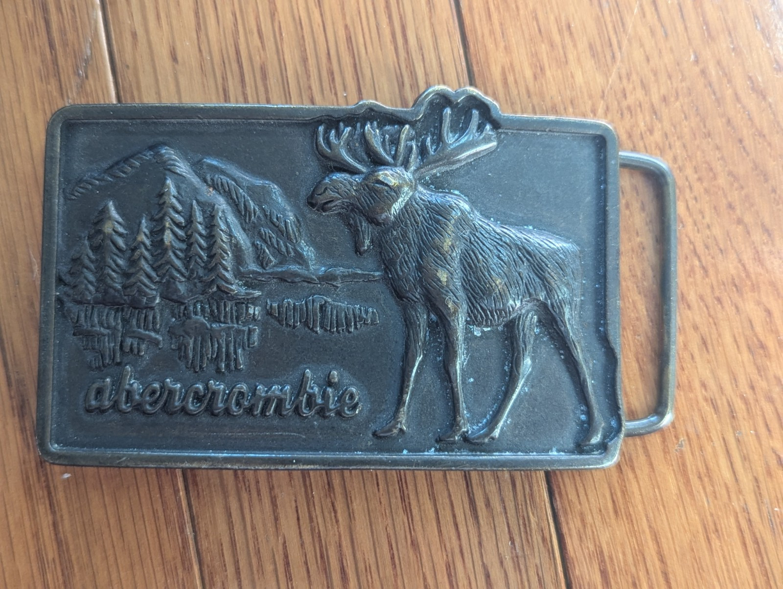 Vintage Abercrombie Embossed Moose Brass color metal alloy belt buckle